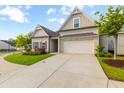 Craftsman style home with a 2-car garage and nicely landscaped yard at 601 Cork St, Woodstock, GA 30188