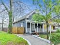 Gray house with a wooden walkway leading to the front porch at 601 Formwalt Sw St, Atlanta, GA 30312