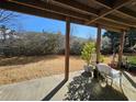 Covered patio with view of backyard at 3974 Stillwater Dr, Duluth, GA 30096