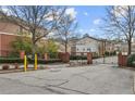 Secured entrance to the community featuring brick pillars, iron gates, and well-maintained landscaping at 3058 Turman Cir, Decatur, GA 30033