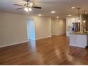 Bright and airy living room with hardwood floors at 7843 Nolan Trl Trl, Snellville, GA 30039