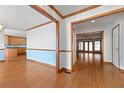 Hardwood floors and view into the living area and kitchen at 796 Marion Beavers Rd, Sharpsburg, GA 30277