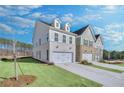 Modern townhome community featuring attractive brick and siding exteriors at 5615 Tillman Way, Powder Springs, GA 30127