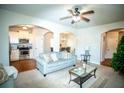Spacious living room with open floor plan and a view of kitchen at 264 Magnaview Dr, Mcdonough, GA 30253