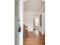 Bright foyer boasting hardwood floors leading to living spaces and a glimpse into the bathroom at 332 Shadowmoor Dr, Decatur, GA 30030