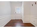 Bright foyer with wood floors and white wainscoting at 1693 Fair Oak Way, Mableton, GA 30126