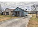 Cute bungalow with a screened porch and long driveway at 374 Hawkins St, Marietta, GA 30060