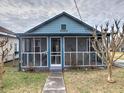 Quaint blue house featuring a screened porch at 374 Hawkins St, Marietta, GA 30060