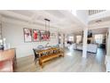 Spacious dining room open to the living room with hardwood floors and lots of light at 4596 Birch Way, Loganville, GA 30052