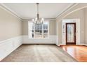 Formal dining room with hardwood floors and large windows at 2812 Havenwood Dr, Conyers, GA 30094