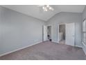 Spacious bedroom with neutral carpeting and ceiling fan at 287 Jenna Ln, Dallas, GA 30157