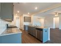 Spacious kitchen with granite countertops and stainless steel appliances at 3732 Stonebranch Ln, Loganville, GA 30052