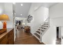 Bright entryway with hardwood floors, staircase and transitional decor at 4266 Valley Trail Se Dr, Atlanta, GA 30339