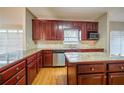 Kitchen featuring stainless steel appliances, an island, and granite countertops at 2400 Stedman Sw Ln, Conyers, GA 30094