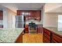 A gourmet kitchen with stainless steel appliances and granite countertops at 2400 Stedman Sw Ln, Conyers, GA 30094