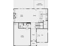 Main floor plan showcasing kitchen, dining, living areas, and garage at 3208 Shirecrest Ln, Dacula, GA 30019