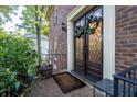 Elegant double front doors with decorative glass and a welcoming entryway at 2339 Milstead Cir, Marietta, GA 30066