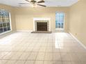 Living room with fireplace and tile floors at 1089 Brittwood Pl, Norcross, GA 30093