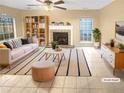 Virtually staged living room with fireplace and tile floors at 1089 Brittwood Pl, Norcross, GA 30093