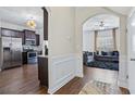Open concept living area with kitchen view at 8785 Seneca Rd, Palmetto, GA 30268