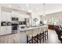 Modern kitchen with stainless steel appliances and granite countertops at 504 Crescent Woode Drive Dr, Dallas, GA 30157