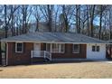 Charming single-story brick home with gray shutters and a well-maintained front yard at 2773 Fairlane Dr, Atlanta, GA 30354