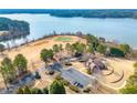 Scenic aerial view of golf course with a pond and lush landscaping at 5269 Heron Bay Blvd, Locust Grove, GA 30248