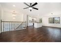 Open concept living room with kitchen and hardwood floors at 942 Azalea Cir, Marietta, GA 30062