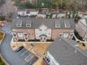 Aerial view of a townhome community showing building and parking at 1208 Stone Castle Cir # 3, Smyrna, GA 30080