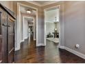 Hardwood floor hallway with views into other rooms at 217 Towering Peaks, Canton, GA 30114