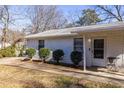 Side view of white brick duplex with shrubbery at 2698 George Nw St, Atlanta, GA 30318