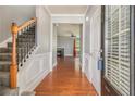 Bright and spacious entryway with hardwood floors and a staircase at 4367 Favored Way, Union City, GA 30291