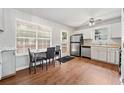 Eat-in kitchen with stainless steel appliances and laminate floor at 45 Ashbury Ct, Dallas, GA 30157