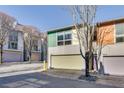 View of townhome building and parking area at 1213 Van Allen Nw Mews # 47, Atlanta, GA 30318