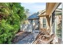 Charming side yard with walkway and seating area at 418 Kenley Ct, Mcdonough, GA 30253