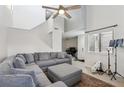 Bright living room boasting soaring ceilings, neutral decor, and comfortable sectional seating area at 1403 Parkaire Xing, Marietta, GA 30068