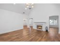 Bright living room with hardwood floors, fireplace, and high ceilings at 2224 Snug Ne Hbr, Marietta, GA 30066