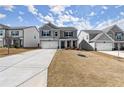 Attractive two-story home featuring light gray siding and inviting curb appeal at 339 Garnet Dr, Acworth, GA 30101