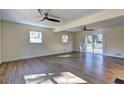 Spacious living room with hardwood floors and sliding glass doors at 4210 Pepperdine Dr, Decatur, GA 30034