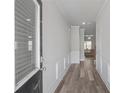 Bright entryway with wood-look floors and white wainscoting at 5536 Rockfern Dr, Lilburn, GA 30047