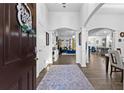 Bright and spacious entryway with views into the living and dining areas at 7417 Jennadee Dr, Fairburn, GA 30213