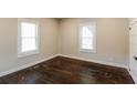 Bright bedroom with hardwood floors and neutral walls at 1847 New Ne St, Conyers, GA 30012