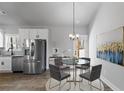 Cozy dining area with stainless steel appliances, granite countertops, and natural light at Tract1 Harmony Rd, Temple, GA 30179