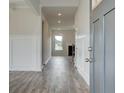 Bright entryway with gray door and wood-look floors at 142 Buffalo Trce, Stockbridge, GA 30281