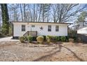 Newly renovated home with a spacious front yard at 1084 Fairburn Nw Rd, Atlanta, GA 30331