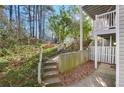 Steps leading to a patio and fenced backyard at 2006 Augusta Se Dr, Marietta, GA 30067
