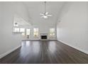 Spacious living room with hardwood floors and a fireplace at 60 Legend Creek Holw, Douglasville, GA 30134