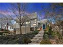 Striking modern home with unique architectural details and lush landscaping at 727 Berkeley Nw Ave, Atlanta, GA 30318