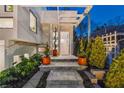 Inviting front entrance with stone walkway, manicured landscaping and modern architectural details at 727 Berkeley Nw Ave, Atlanta, GA 30318