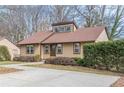 A charming single-story house with a well-manicured lawn and neat shrubbery at 3847 Admiral Dr, Chamblee, GA 30341
